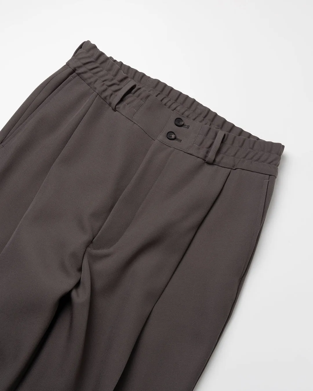 HEAVY WOOL GABARDINE FLARE EASY TROUSERS .10【GUNMETAL】