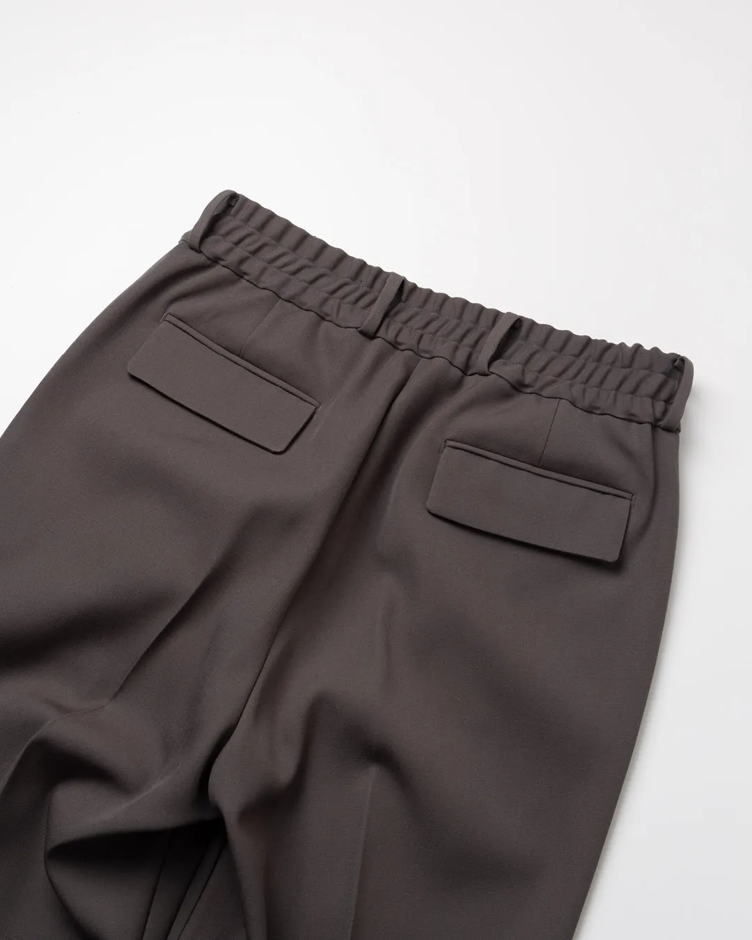 HEAVY WOOL GABARDINE FLARE EASY TROUSERS .10【GUNMETAL】