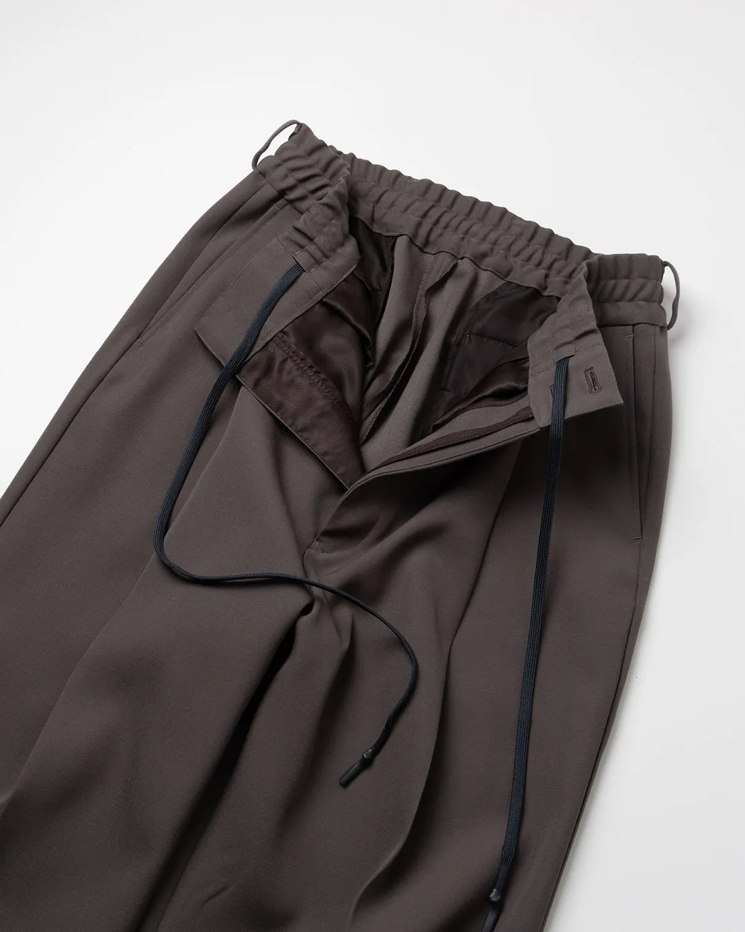 HEAVY WOOL GABARDINE FLARE EASY TROUSERS .10【GUNMETAL】