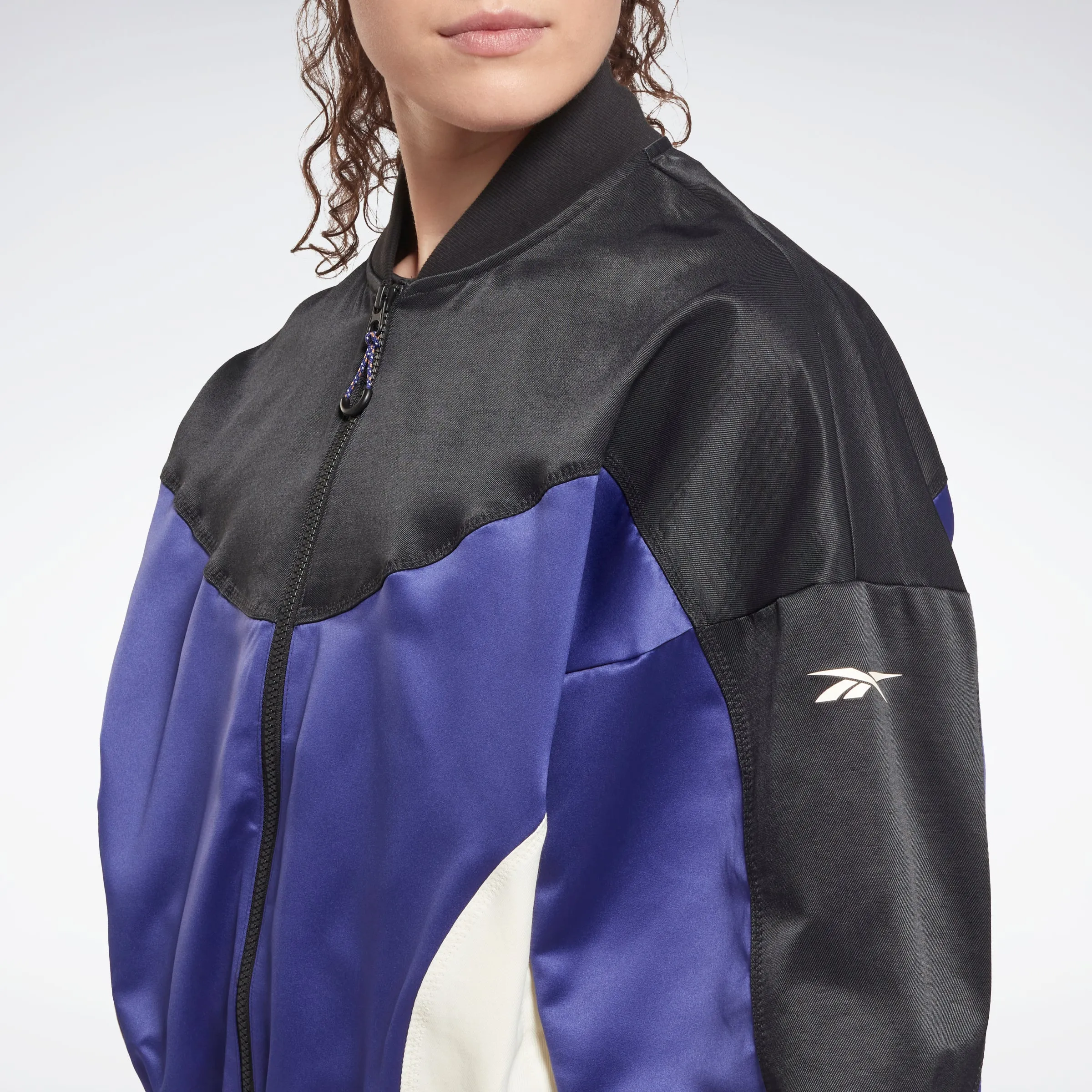 Reebok Apparel Women Tech Style Windbreaker Bolprp